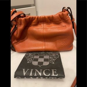 This soft pumpkin colored bag is in very good condition!